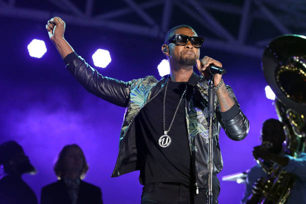 Usher and The Roots perform during The Concert for Peace and Justice celebrating the opening of The Legacy Museum at Riverwalk Amphitheater on April...