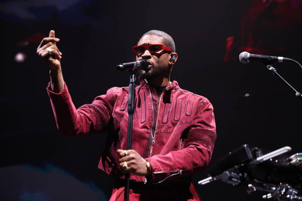 Usher performs onstage during iHeartRadio Channel 95.5's Jingle Ball 2023 at Little Caesars Arena on December 05, 2023 in Detroit, Michigan.