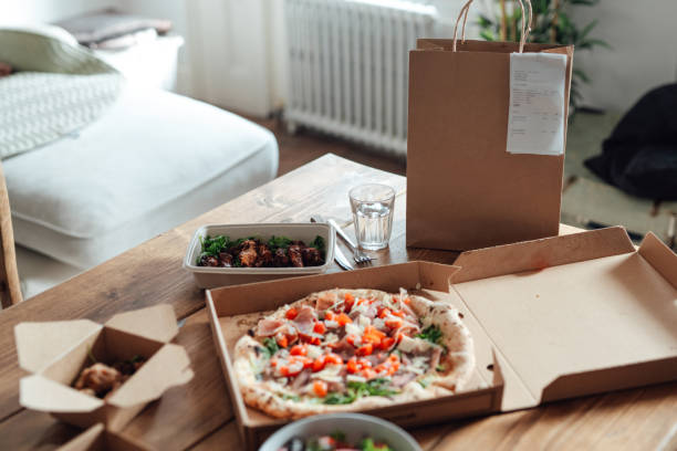 variation of takeaway meal on the table - food stock pictures, royalty-free photos & images