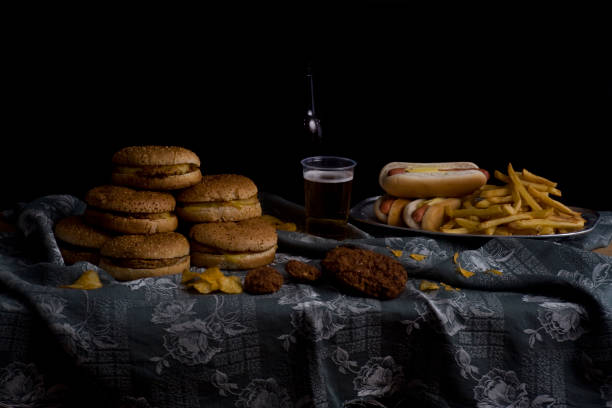 variety of fast food and beer bottle, still life - junk food stock pictures, royalty-free photos & images