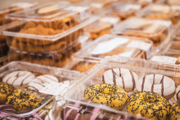 variety of prepackaged bake pastry items in the supermarket - junk food stock pictures, royalty-free photos & images