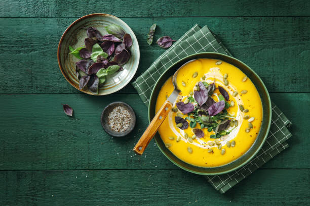 vegan creamy roasted pumpkin soup - food stock pictures, royalty-free photos & images