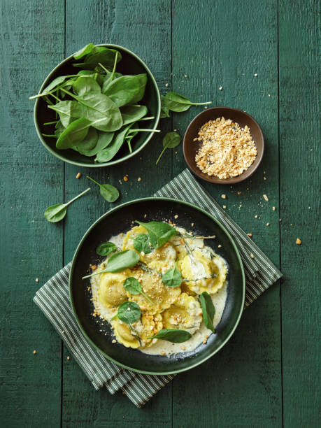 vegan spinach and mushroom ravioli - food stock pictures, royalty-free photos & images