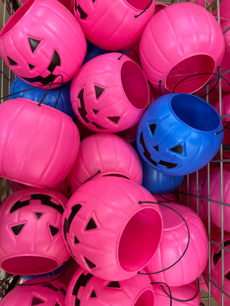 vibrant pink and blue plastic halloween baskets - home decoration stock pictures, royalty-free photos & images