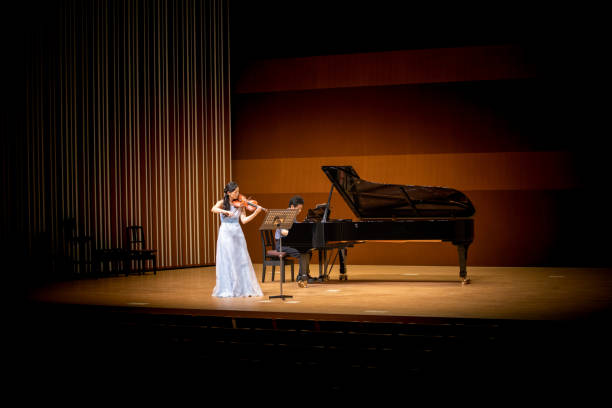 violin and piano concert - concert stock pictures, royalty-free photos & images