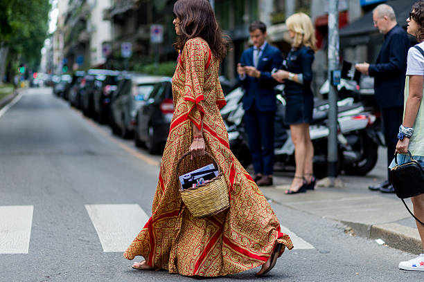 Viviana Volpicella wearing boho dress outside Dolce & Gabbana during the Milan Men's Fashion Week Spring/Summer 2017 on June 18, 2016 in Milan, Italy.