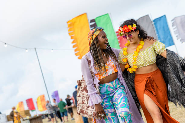 walking through a festival - concert stock pictures, royalty-free photos & images