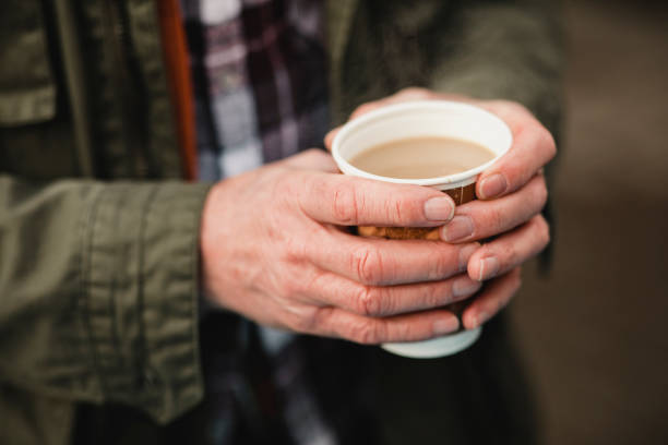 warming up with a coffee - junk food stock pictures, royalty-free photos & images