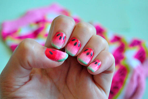 watermelon nail art on fingernails - nails art stock pictures, royalty-free photos & images