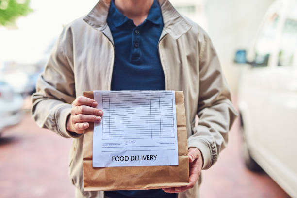 we deliver while it's still hot - junk food stock pictures, royalty-free photos & images