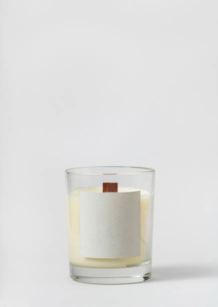 white candle bottle on a light gray background - home decoration stock pictures, royalty-free photos & images