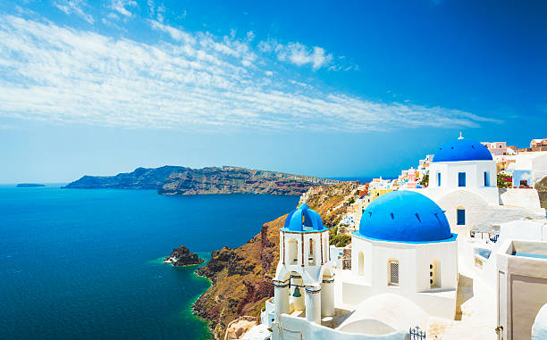 white church in oia town on santorini island in greece - travel stock pictures, royalty-free photos & images