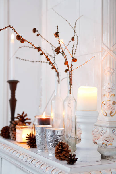winter decorations with candles - home decoration stock pictures, royalty-free photos & images