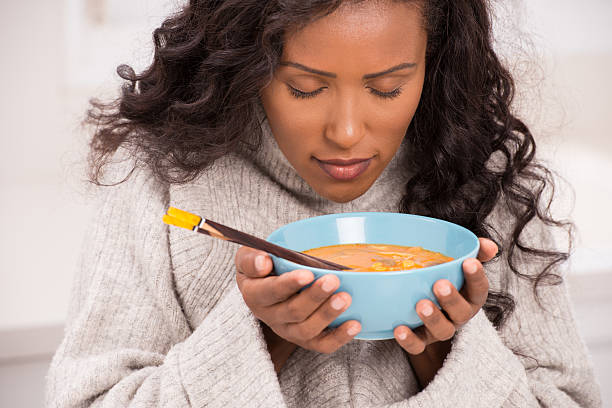 woman enjoying soup. - food stock pictures, royalty-free photos & images