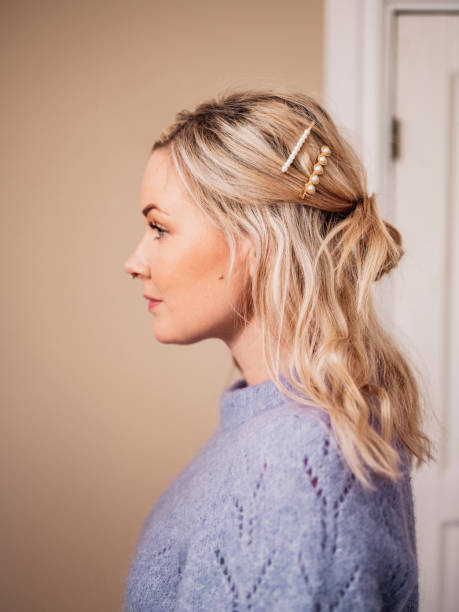 woman hairstyle with modern hair accessories - hairstyle stock pictures, royalty-free photos & images