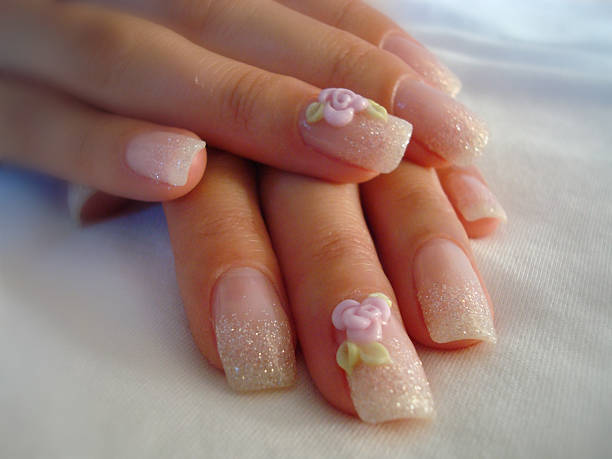 woman hand with nail art - nails art stock pictures, royalty-free photos & images
