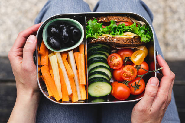 woman having healthy lunch - food stock pictures, royalty-free photos & images