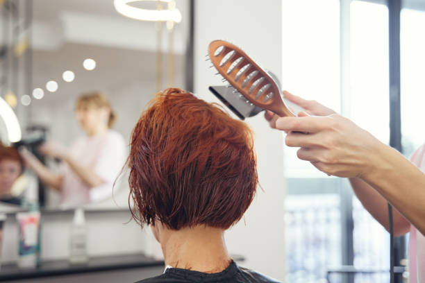 woman in beauty salon - hairstyle stock pictures, royalty-free photos & images