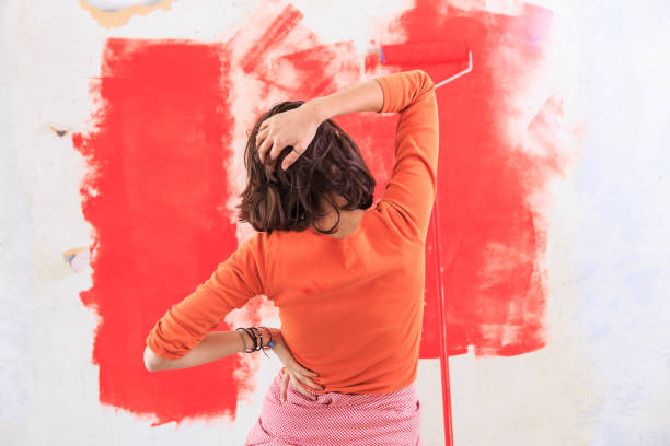 woman making home improvement and having problems - home decoration stock pictures, royalty-free photos & images