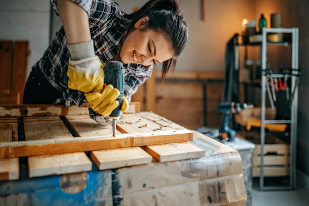 woman screwing with drill - home decoration stock pictures, royalty-free photos & images