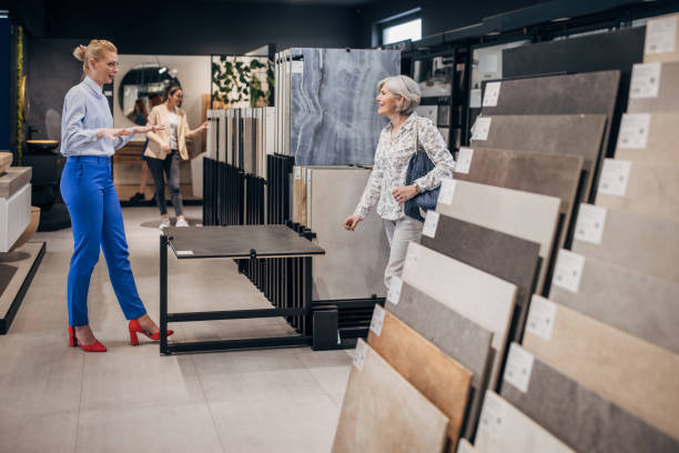 woman shopping for bathroom tiles - home decoration stock pictures, royalty-free photos & images