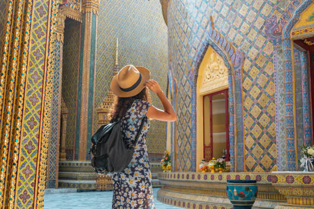 woman traveler at wat ratchabophit temple in bangkok in a summer day - travel stock pictures, royalty-free photos & images