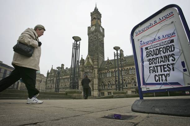 Woman walks through Bradford city centre as it is declared the fattest town in Great Britain on February 1 Bradford, England. A study by Men's...