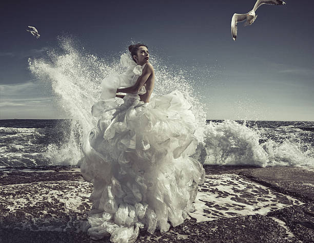 women in plastic bag dress - fashion stock pictures, royalty-free photos & images