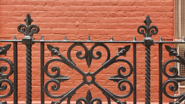 wrought iron fence around residential building in london, england - garden decoration stockfoto's en -beelden