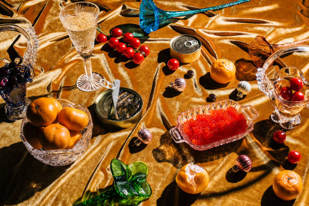 xmas modern dinner table setting on gold velvet fabric background. creative merry christmas celebration concept. contemporary new year festive backdrop - food stock pictures, royalty-free photos & images