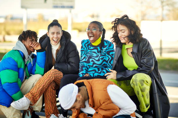 young barcelona friends talking and laughing outdoors - fashion stock pictures, royalty-free photos & images