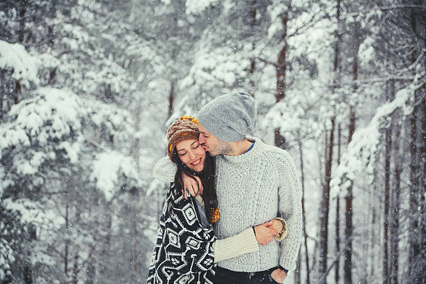 young couple kissing - fashion stock pictures, royalty-free photos & images