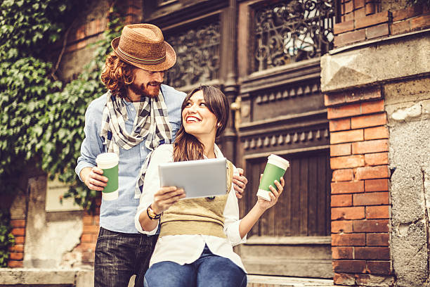 young couple together - junk food stock pictures, royalty-free photos & images