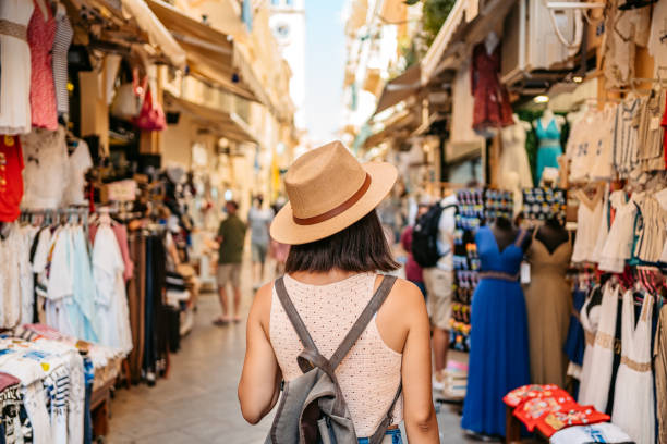 young female tourist at the street market - travel stock pictures, royalty-free photos & images