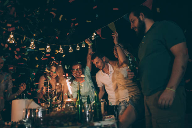 young friends at birthday party - garden decoration stock pictures, royalty-free photos & images