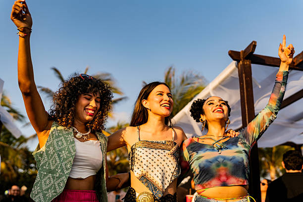 young friends women dancing during party outdoors - concert stock pictures, royalty-free photos & images