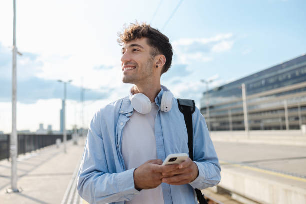 young man on the move - travel stock pictures, royalty-free photos & images
