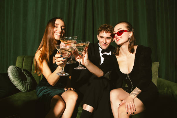 young people celebrate new year's eve - fashion stock pictures, royalty-free photos & images