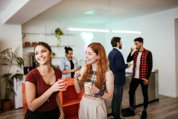 young people re-unite in cafe after lockdown - coffee stock pictures, royalty-free photos & images