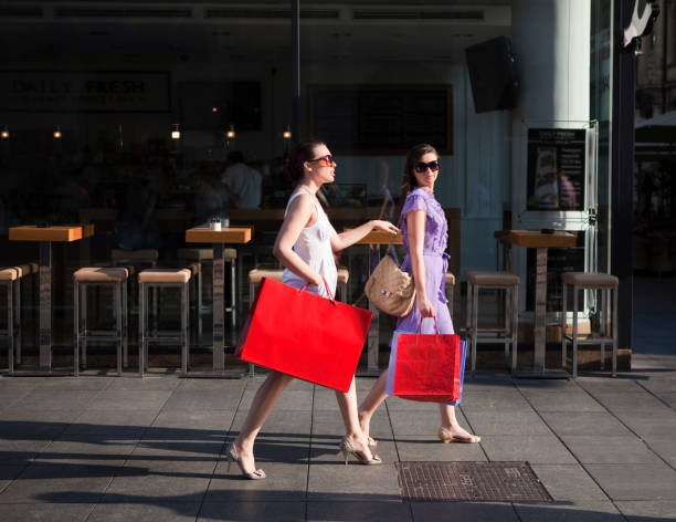 young women shopping - fashion stock pictures, royalty-free photos & images