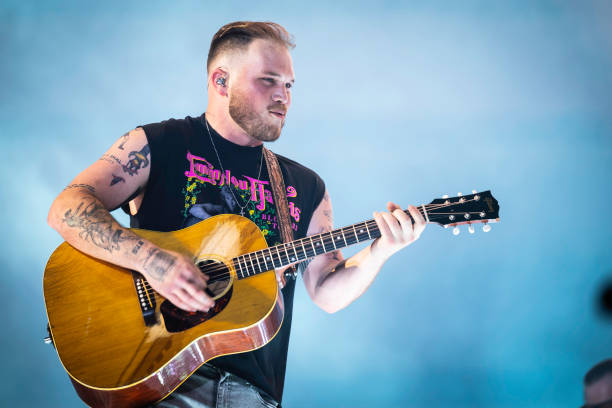 Zach Bryan performs during the Quittin Time tour at Nissan Stadium on June 29, 2024 in Nashville, Tennessee.