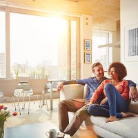 40's couple in apartment - home decoration stock pictures, royalty-free photos & images