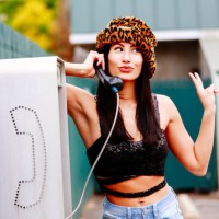 90s woman talking on payphone, cool woman saying goodbye with attitude - fashion stock pictures, royalty-free photos & images