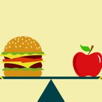 a burger and an apple on a seesaw - junk food stock pictures, royalty-free photos & images