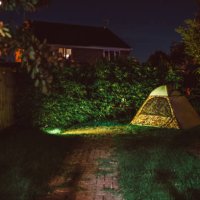 a camping tent setting in the backyard at night - garden decoration stock pictures, royalty-free photos & images