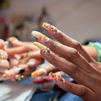 a close-up of a models hand in a nail spa - nails art stock pictures, royalty-free photos & images