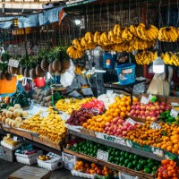 a colorful display of fresh fruits in a market stall in baguio, philippines, featuring various types of tropical produce. - food stock pictures, royalty-free photos & images