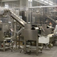 a complex production line with workers in a food factory - food stock pictures, royalty-free photos & images