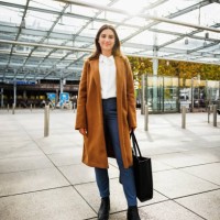 a confident and well dressed woman at the aiport - fashion stock pictures, royalty-free photos & images