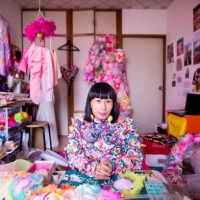 a female contemporary artist working in her studio creating art with textiles - fashion stock pictures, royalty-free photos & images